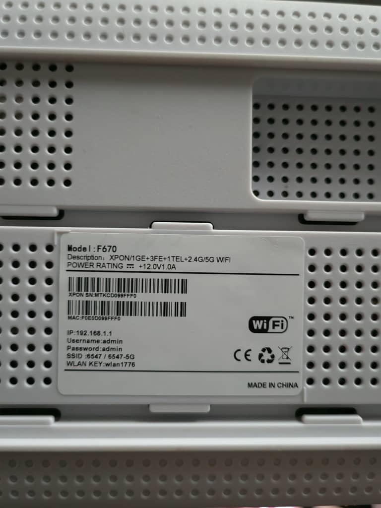 XPON F670 product label showing model F670 and 12V 1A